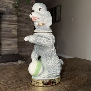 JIM BEAM Whiskey Decanter "Penny the Poodle Dog" in gray. 1970